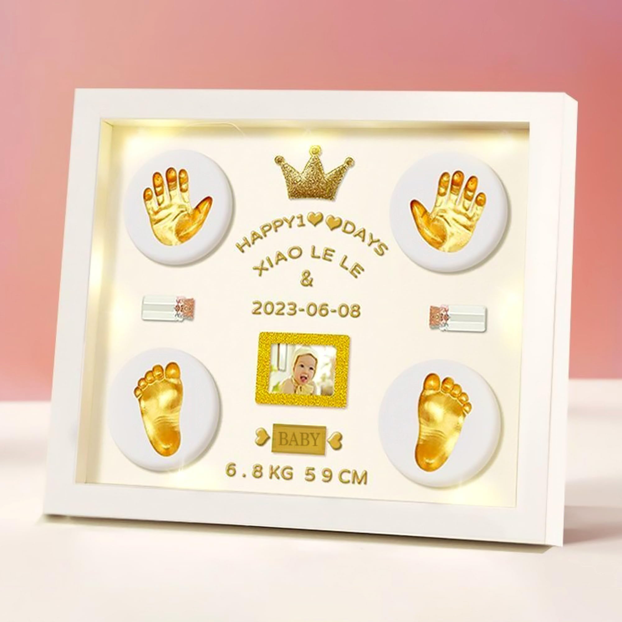 MCstars Baby Handprint Frame with gold lettering on a modern white design for nursery display