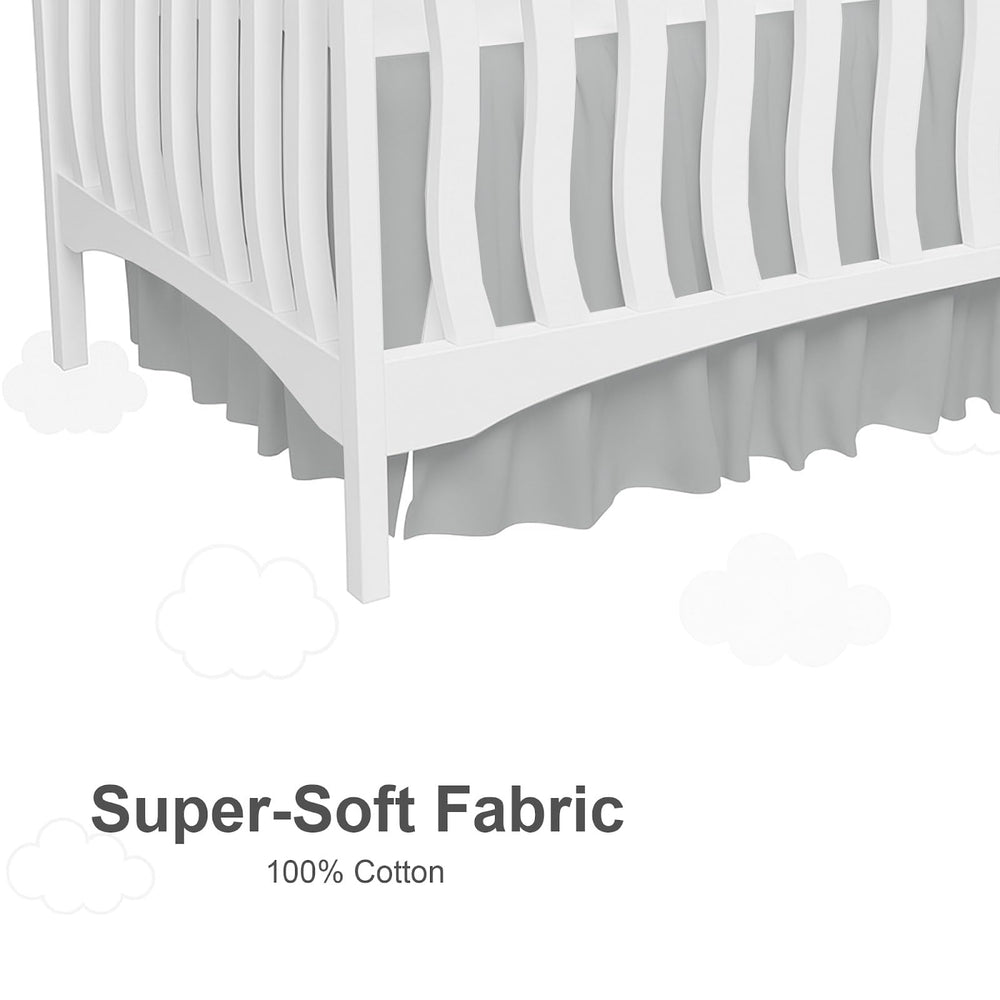 MD Home Decore light grey crib skirt complements any nursery theme