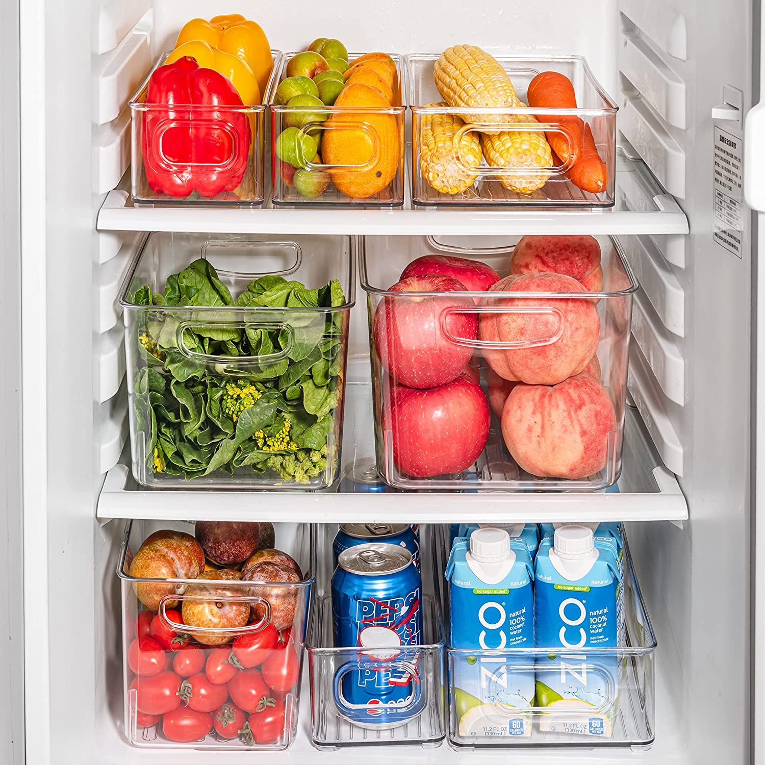 mdesign clear container with lid in freezer for organized bottle storage.