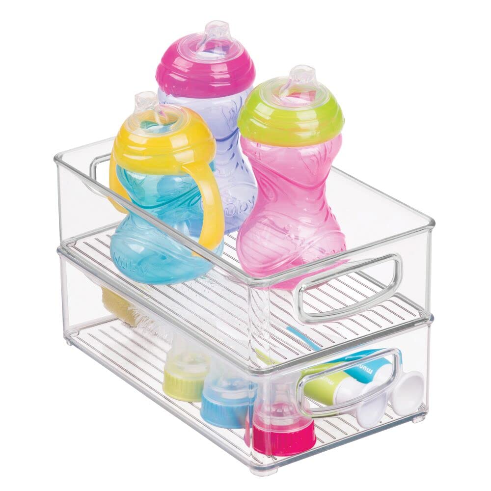 mDesign Ligne clear bin on a shelf supports tidy diapering and feeding supplies.