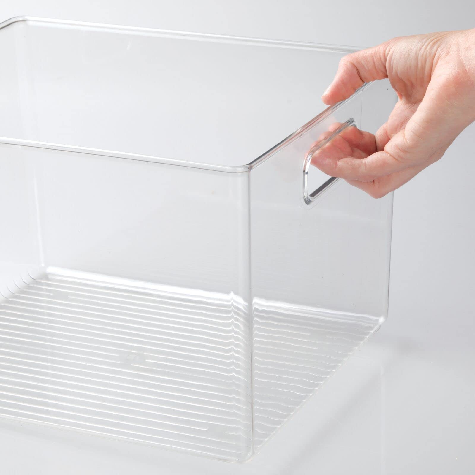mdesign Ligne Collection freezer storage bin helps sort frozen items efficiently.
