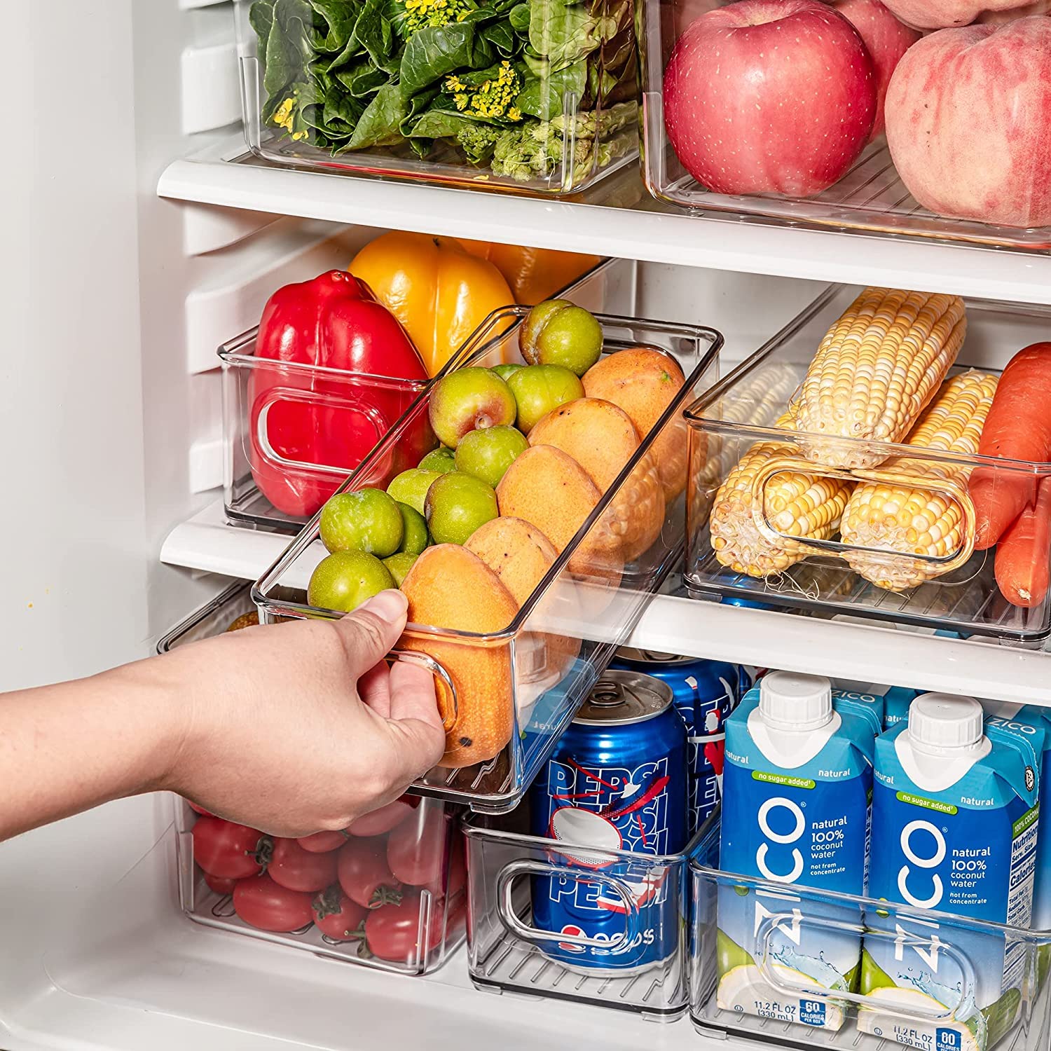 mdesign long storage bin stacked in fridge door for compact organization.