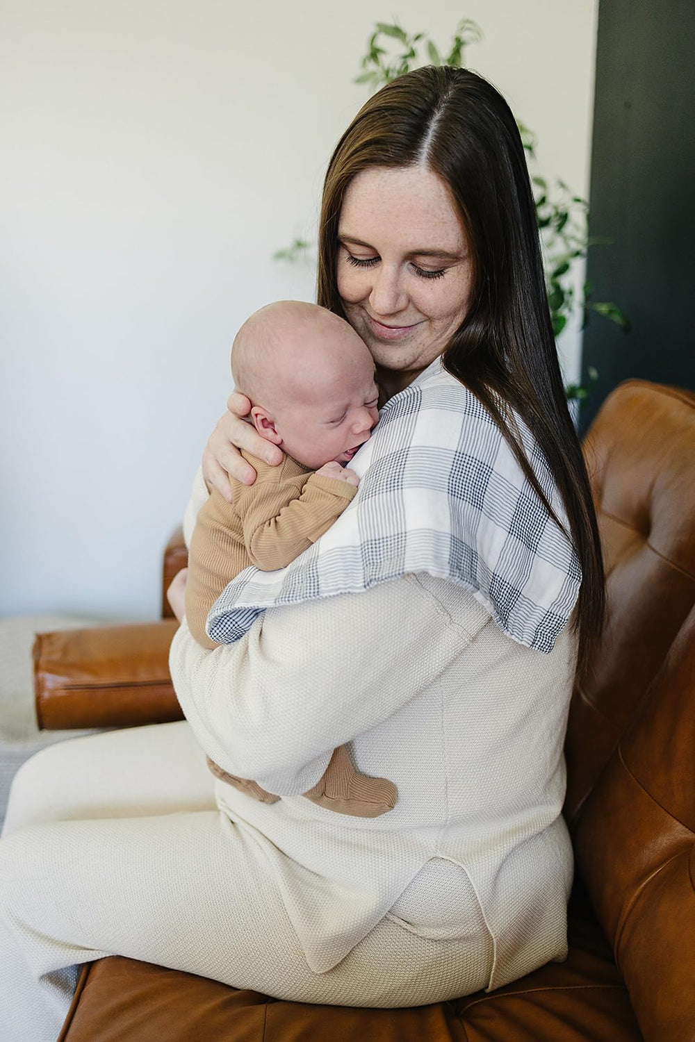 Mebie Baby burp cloth plaid muslin set displayed during changing time with drool protection.