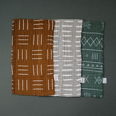 Mebie Baby Burp Cloths in assorted colors; versatile designs to coordinate with gear.