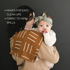 Mebie Baby Burp Cloths in use with baby; protects clothing during feeding.