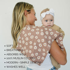 Mebie Baby burp cloths in use on baby, catching drool and spit.
