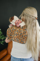Mebie Baby burp cloths feature multi-use design for bibs, washcloths, or spit-up cloths.