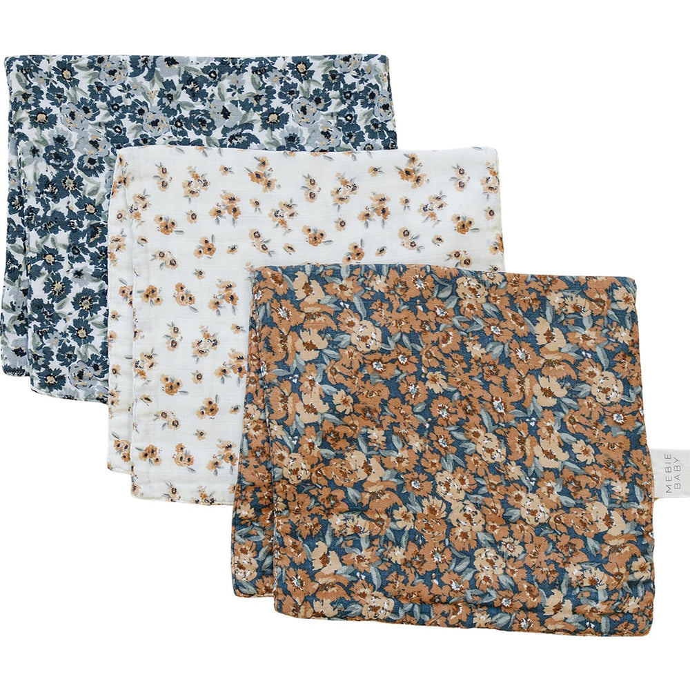 Mebie Baby burp cloths listed as a registry essential for newborn gifts.