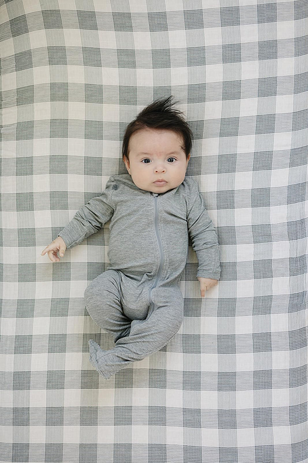 Mebie Baby Coastal Plaid sheet in a calm nursery creates easy-care bedding
