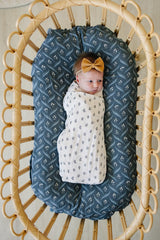 Mebie Baby Cream Berry swaddle close-up highlights breathable cotton fabric