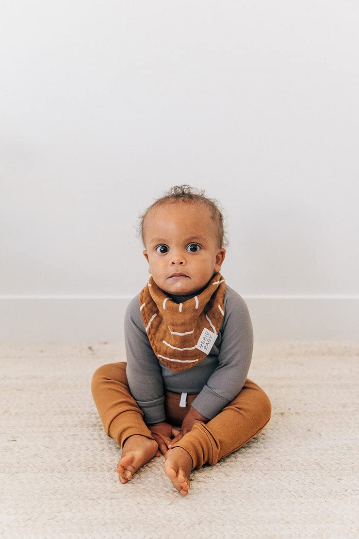 Mebie Baby muslin bib with assorted colors, pairs with many outfits.