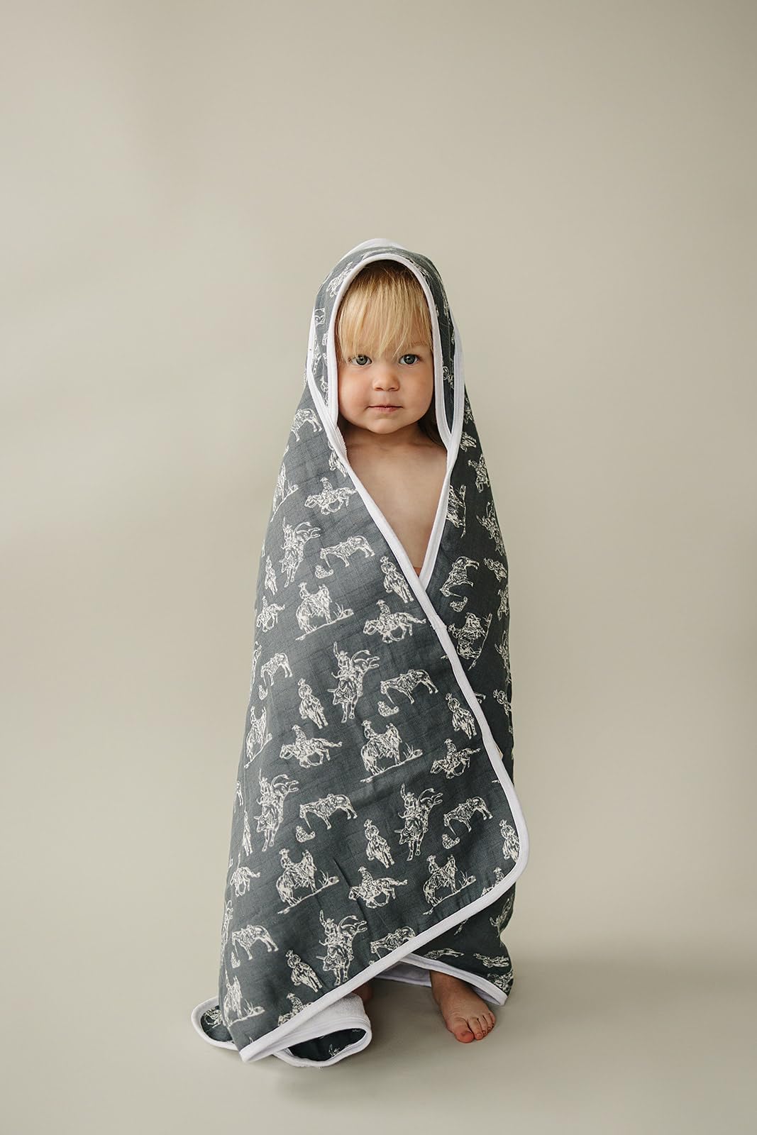 Mebie Baby hooded towel worn by baby, Wild West pattern after bath