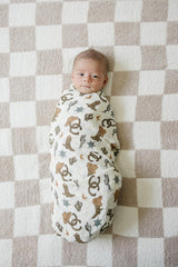 Close-up of 47x47 swaddle size showing breathable muslin fabric.