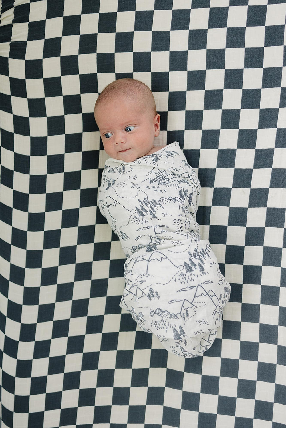 Mebie Baby Summit Muslin Swaddle, versatile light blanket for toddlers and beyond.