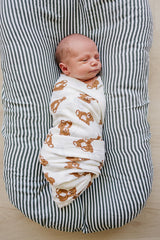Mebie Baby Teddy Bear Muslin Swaddle pattern highlights a neutral design for nursery decor.