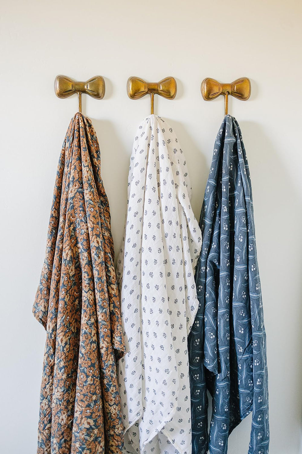 Mebie Baby Venetian Floral Swaddle in a modern nursery setting.