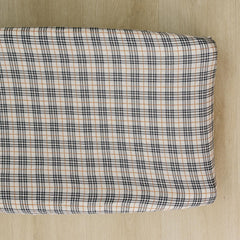 Mebie Baby vintage plaid changing pad cover adds soft, stylish comfort to diaper changes.