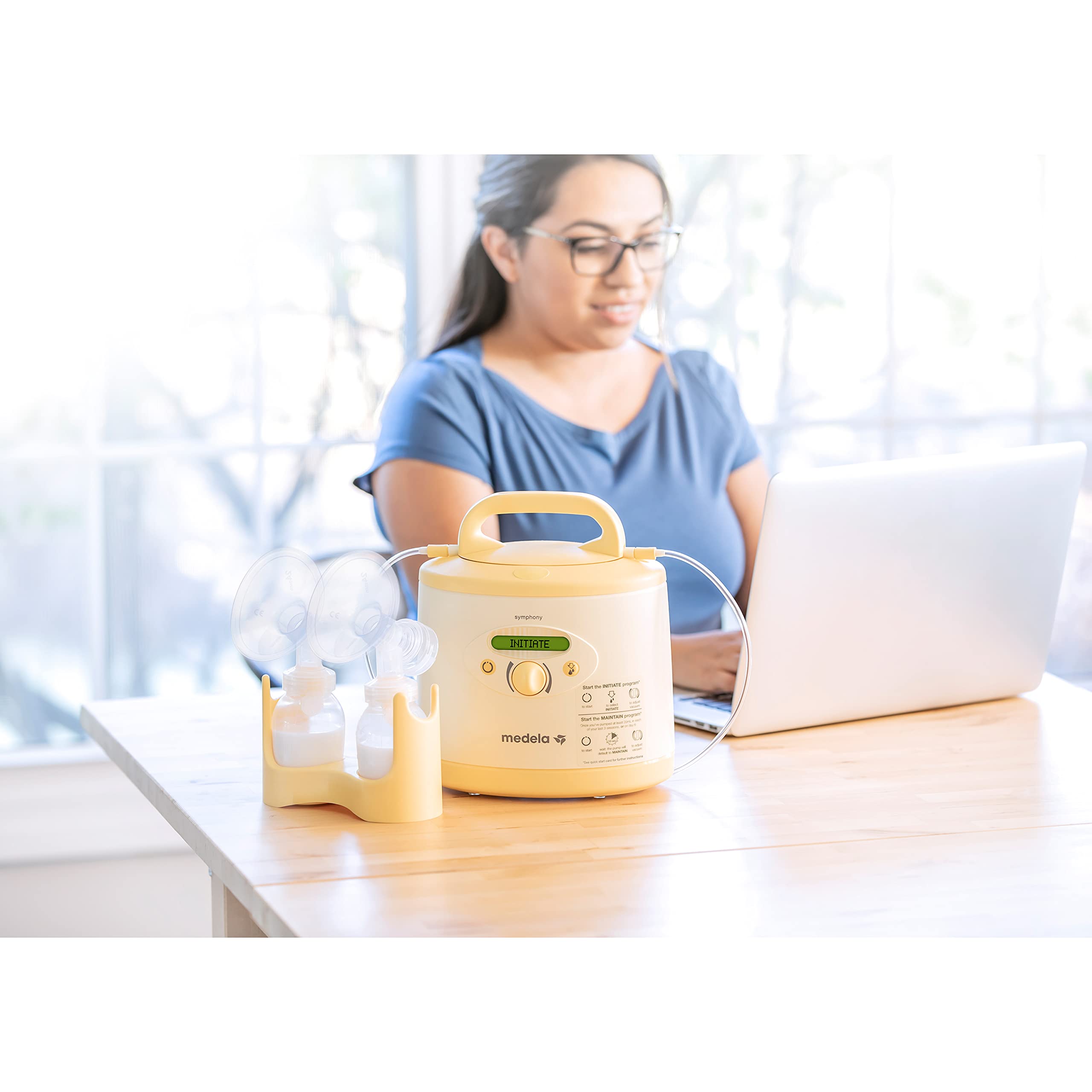 Medela Symphony Plus quick start card guiding fast setup for new users.