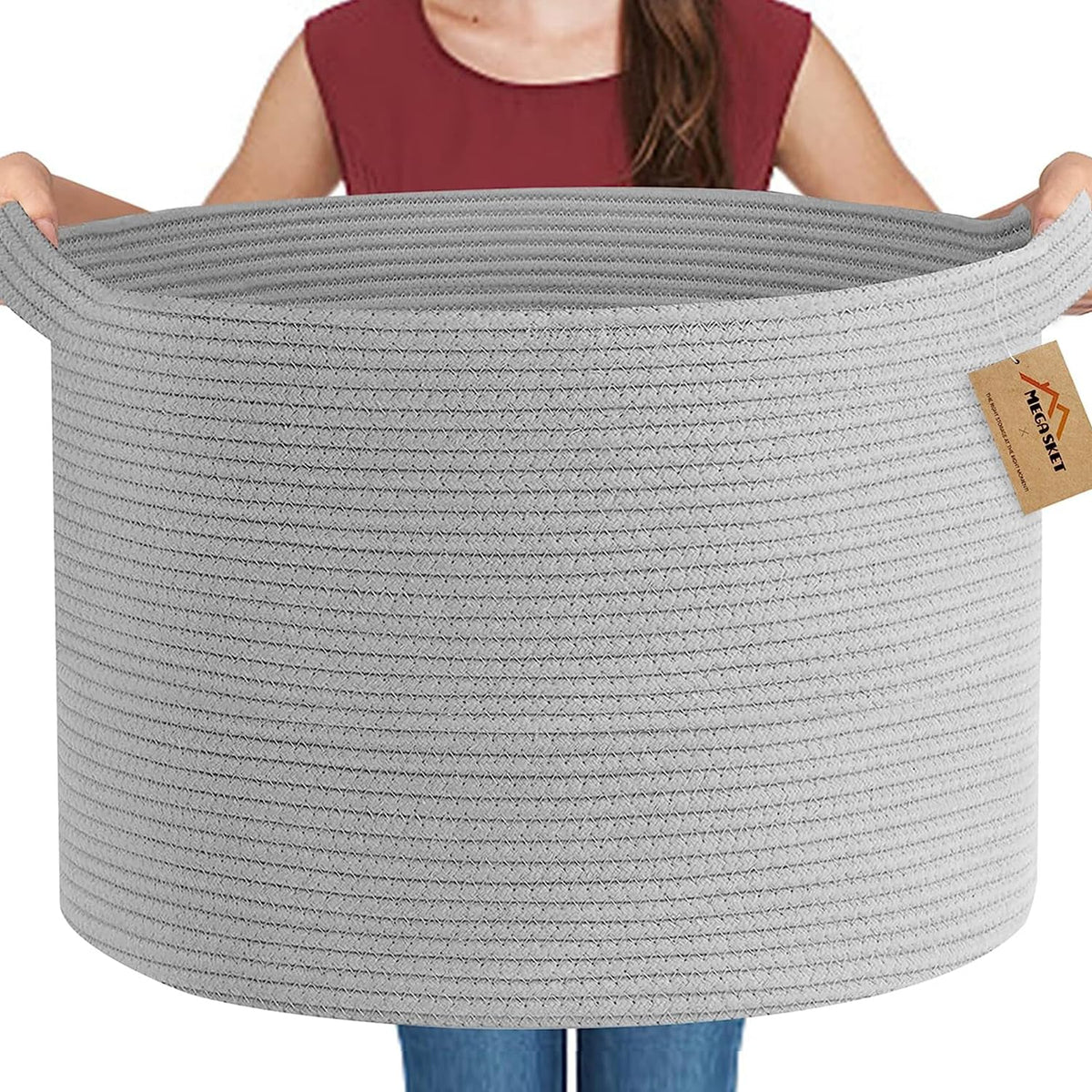 MEGASKET blanket storage basket keeps throws accessible and neatly organized.