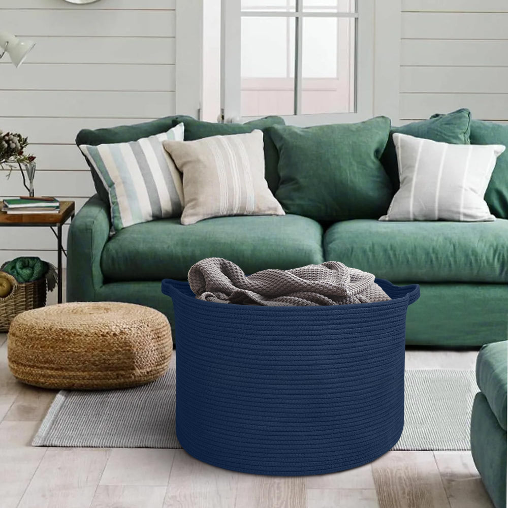 MEGASKET dark blue basket complements neutral decor while storing towels.