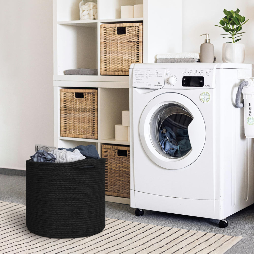 MEGASKET large black basket blanket storage in cozy living space.