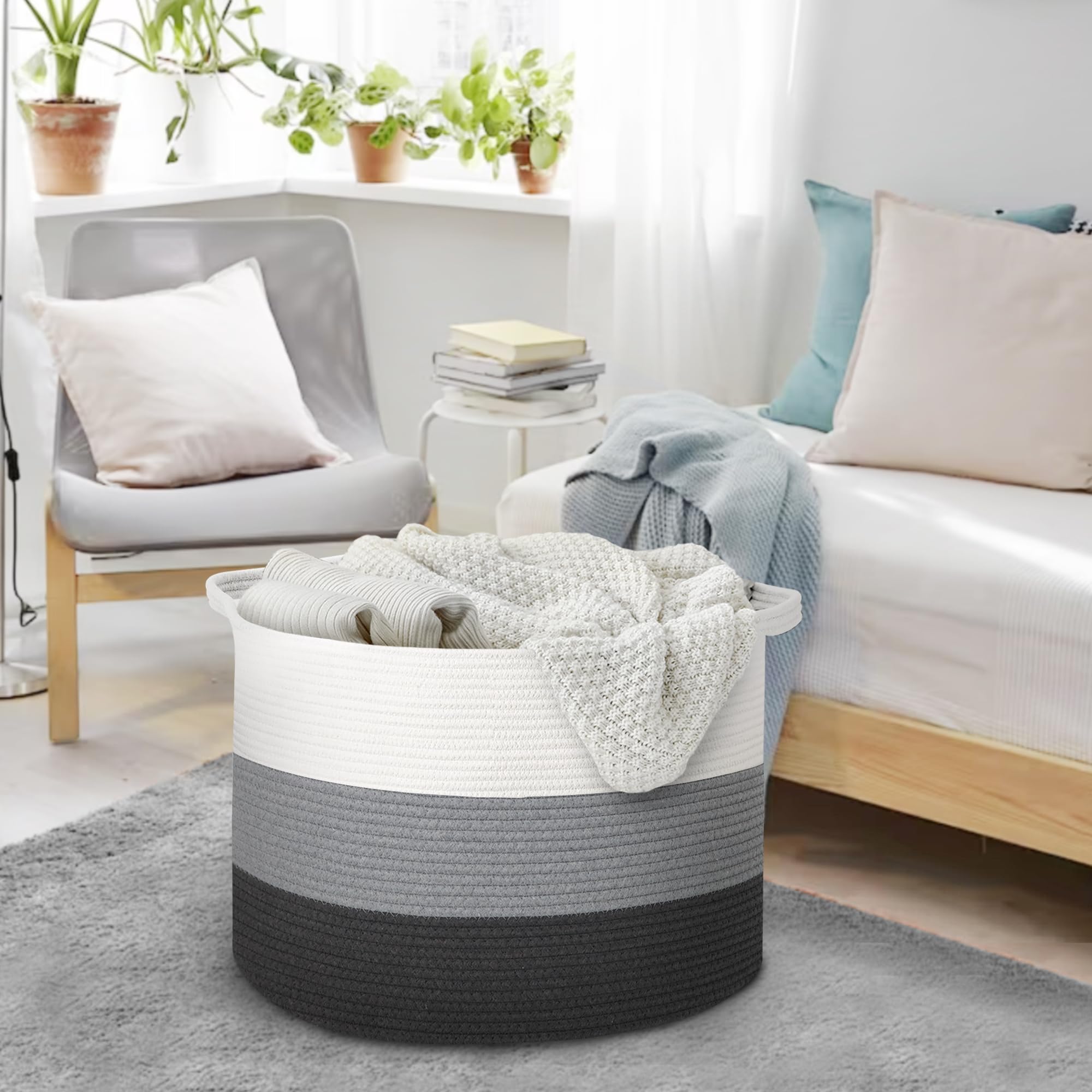 MEGASKET neutral tone basket adds decor while storing throws and pillows.
