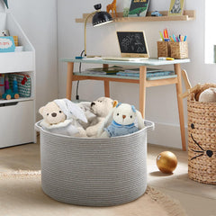 MEGASKET pillow storage basket adds neutral decor while concealing cushions.