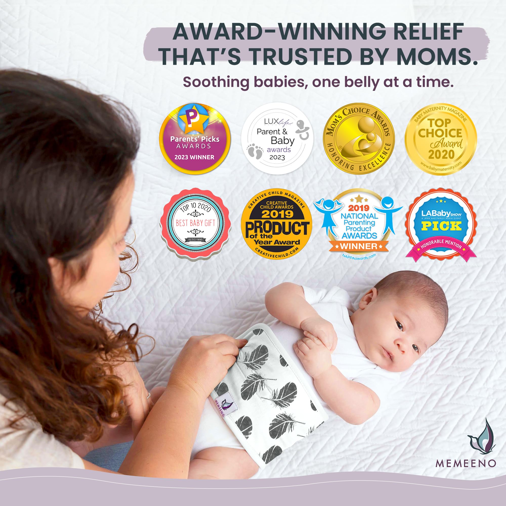 MEMEENO heated tummy wrap on newborn ready for soothing warmth.