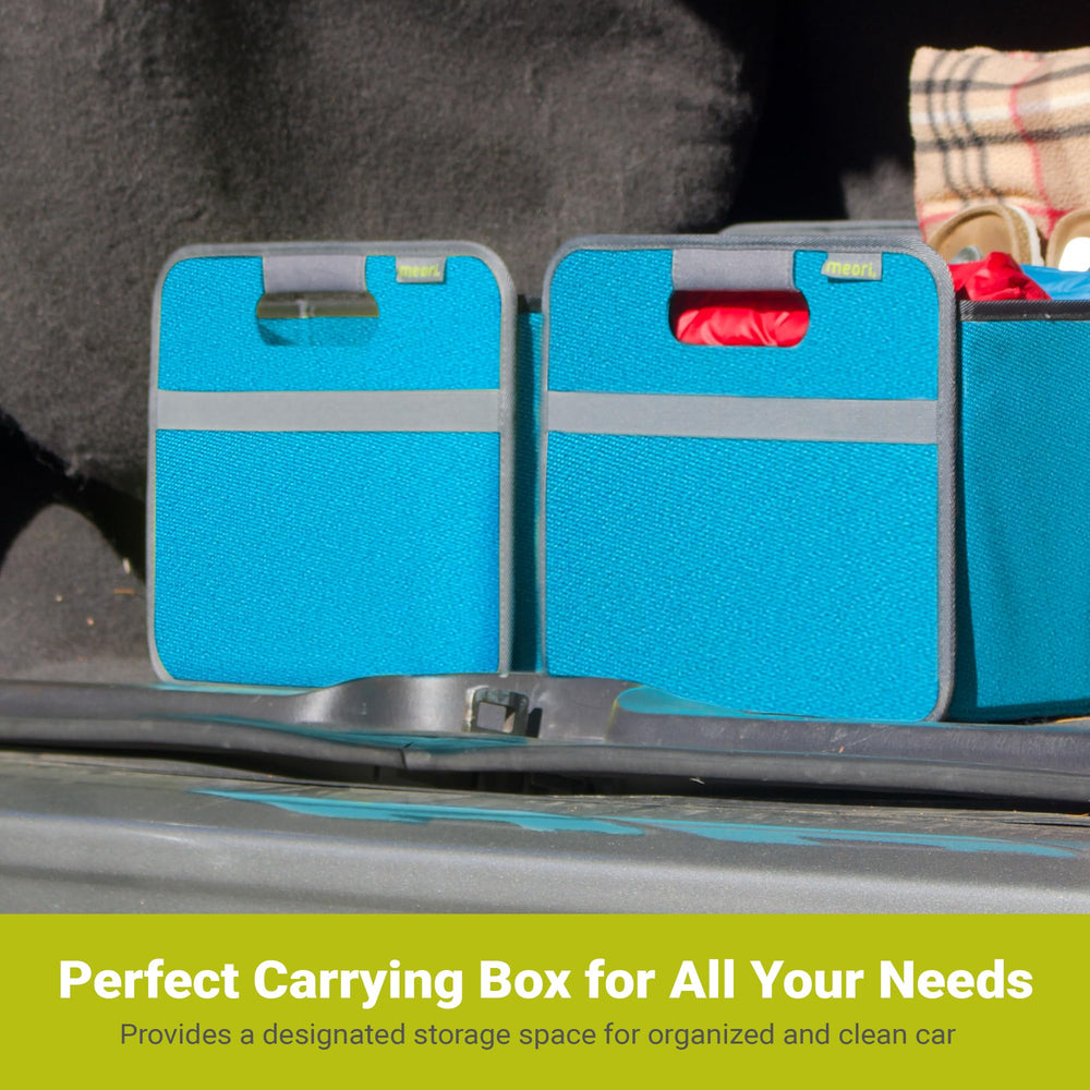 Meori trunk organizer loaded with groceries and gear during a road trip.