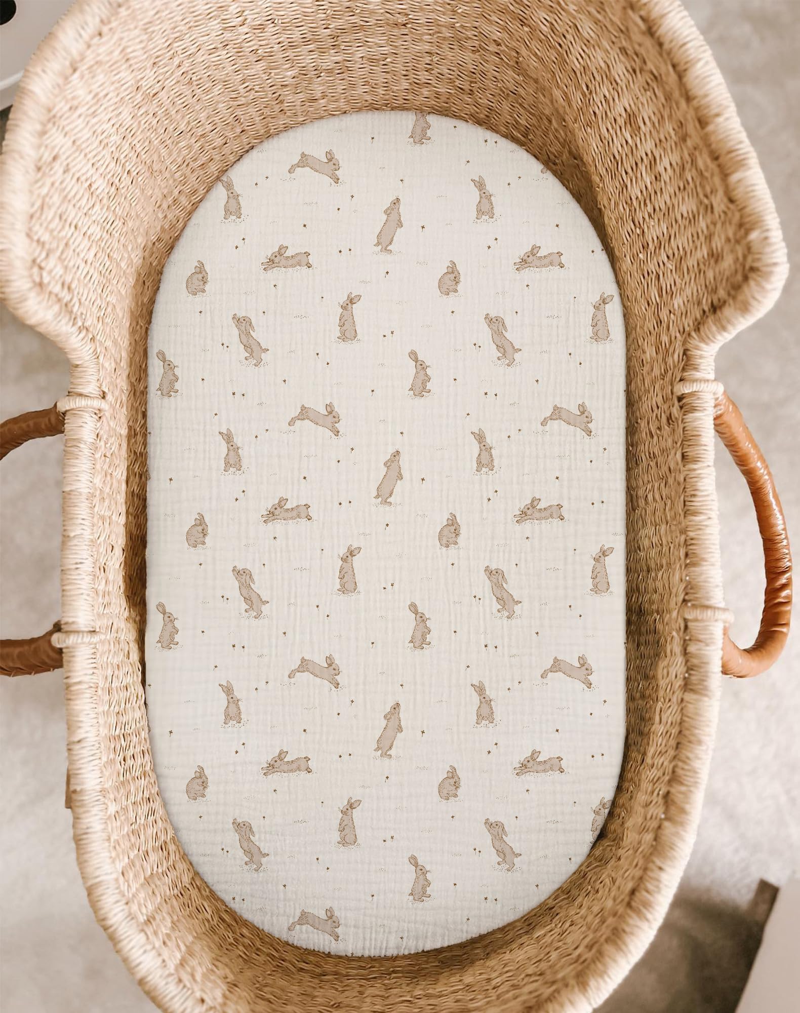 Meowcards bassinet sheet oval-fit provides a soft, secure sleeping area.