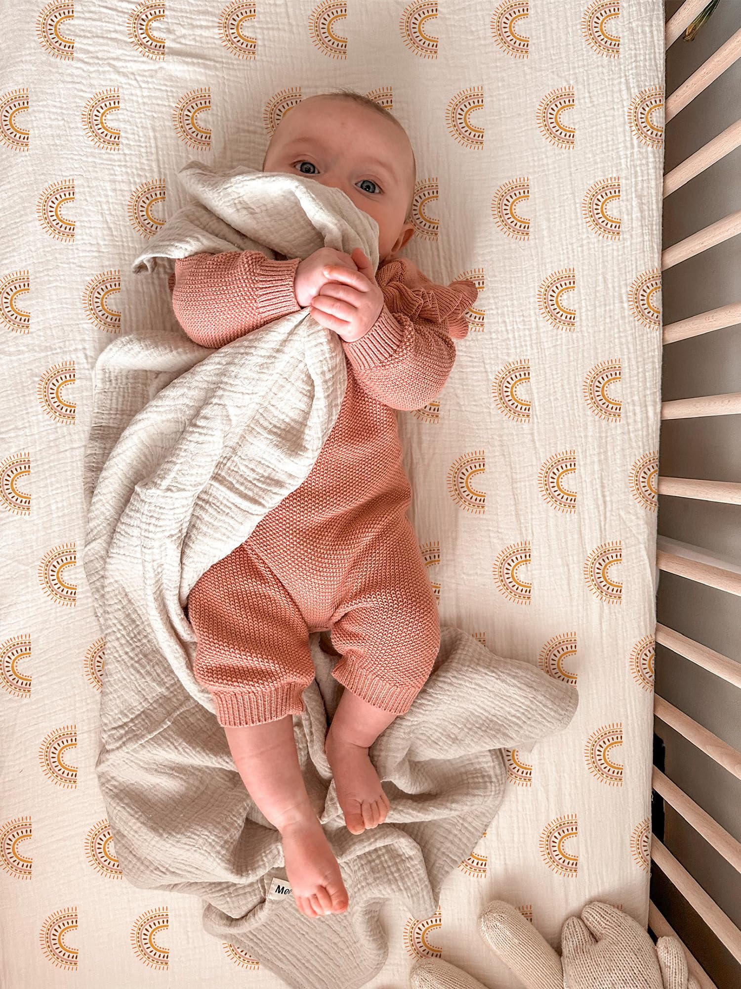 Meowcards bassinet sheet rainbow pattern adds playful style for nursery comfort.