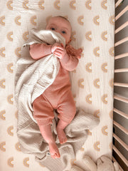 Meowcards bassinet sheet rainbow pattern adds playful style for nursery comfort.