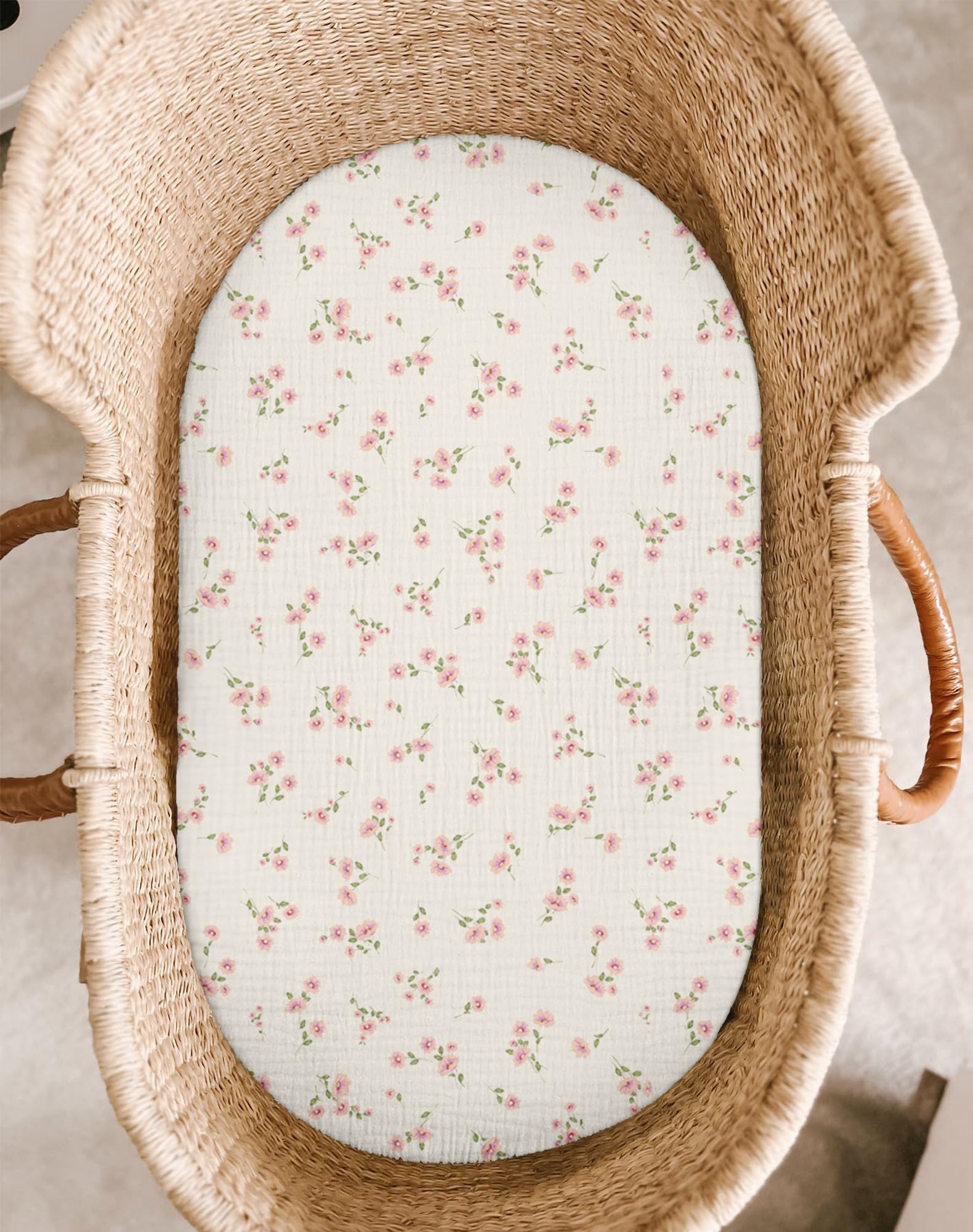 Meowcards rosy oval fit bassinet sheet with breathable muslin for comfortable nights.