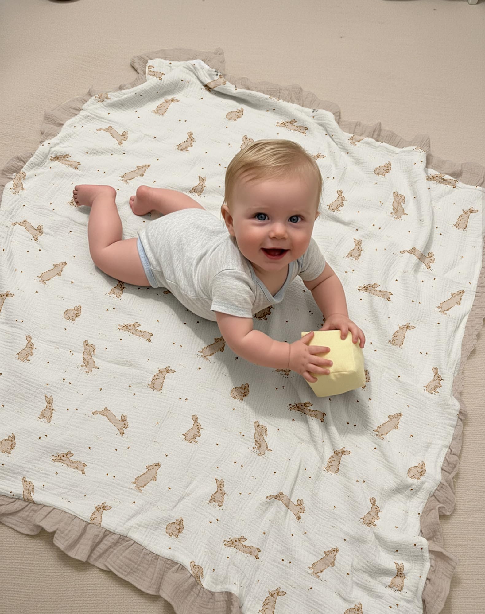Meowcards muslin swaddle doubles as nursing cover for on the go feeds.