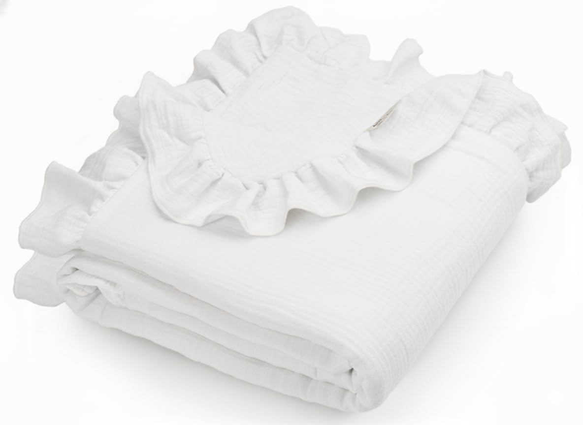 Meowcards muslin swaddle with white ruffles for gentle newborn comfort.