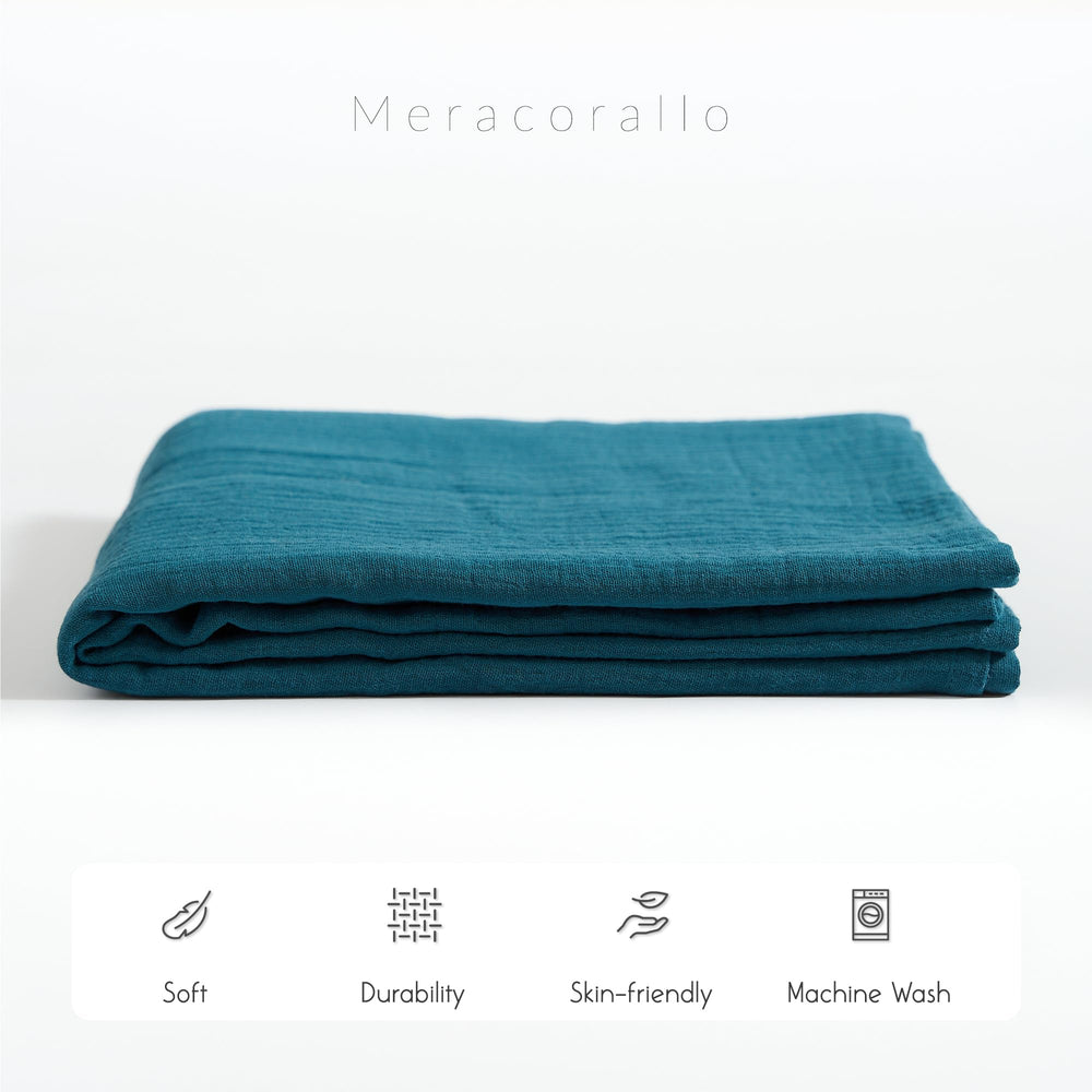 Meracorallo blanket measures 110 x 110 cm for versatile use.