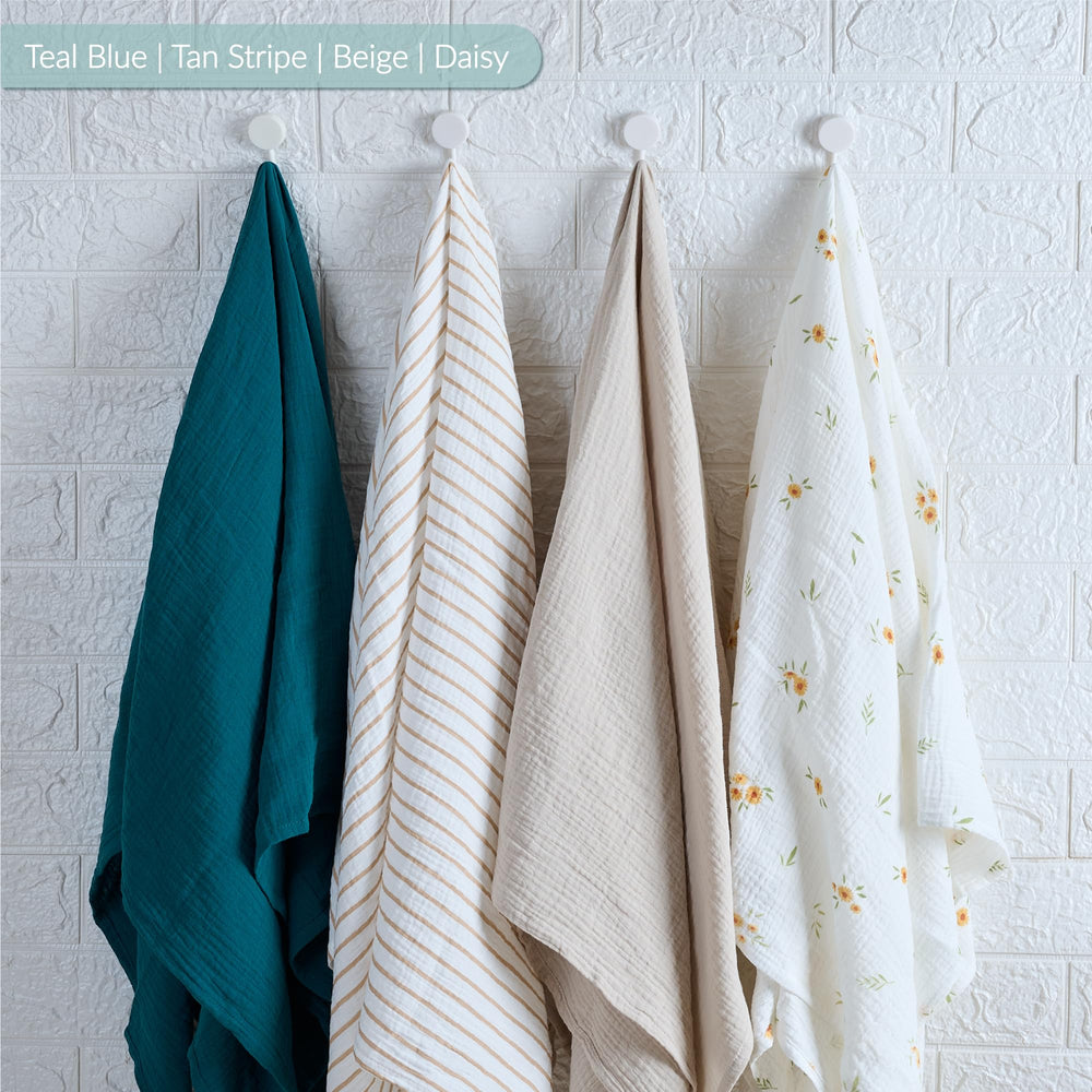 Meracorallo multi-use textile doubles as burping cloth and changing table cover.