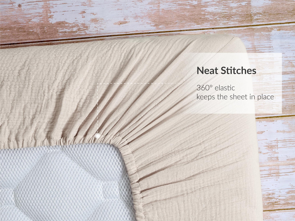 Machine washable Meracorallo muslin crib sheet for busy households.