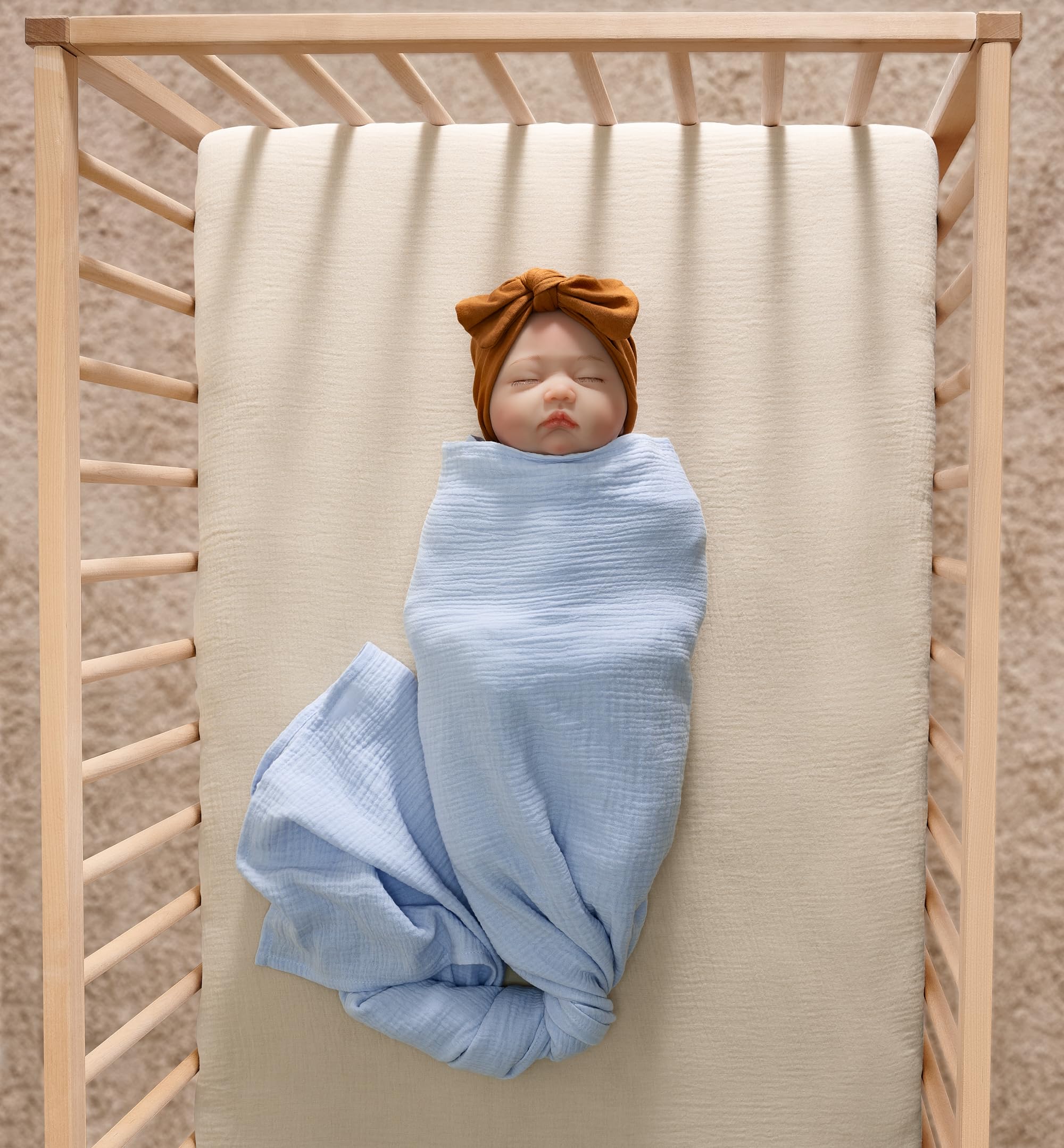 Soft, pre-washed Meracorallo crib sheet adds extra softness for baby naps.