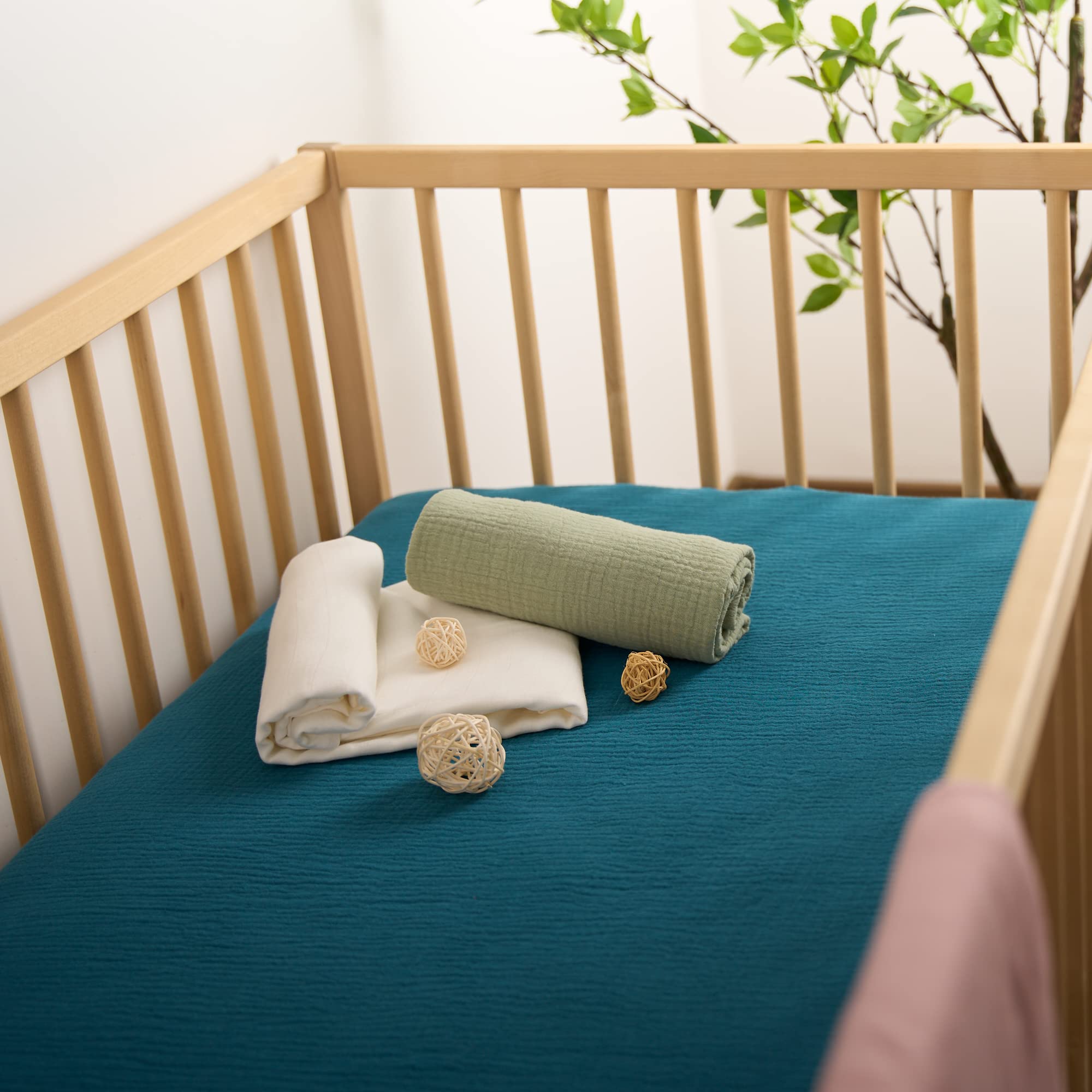 Meracorallo teal crib sheet ready for machine wash and tumble dry