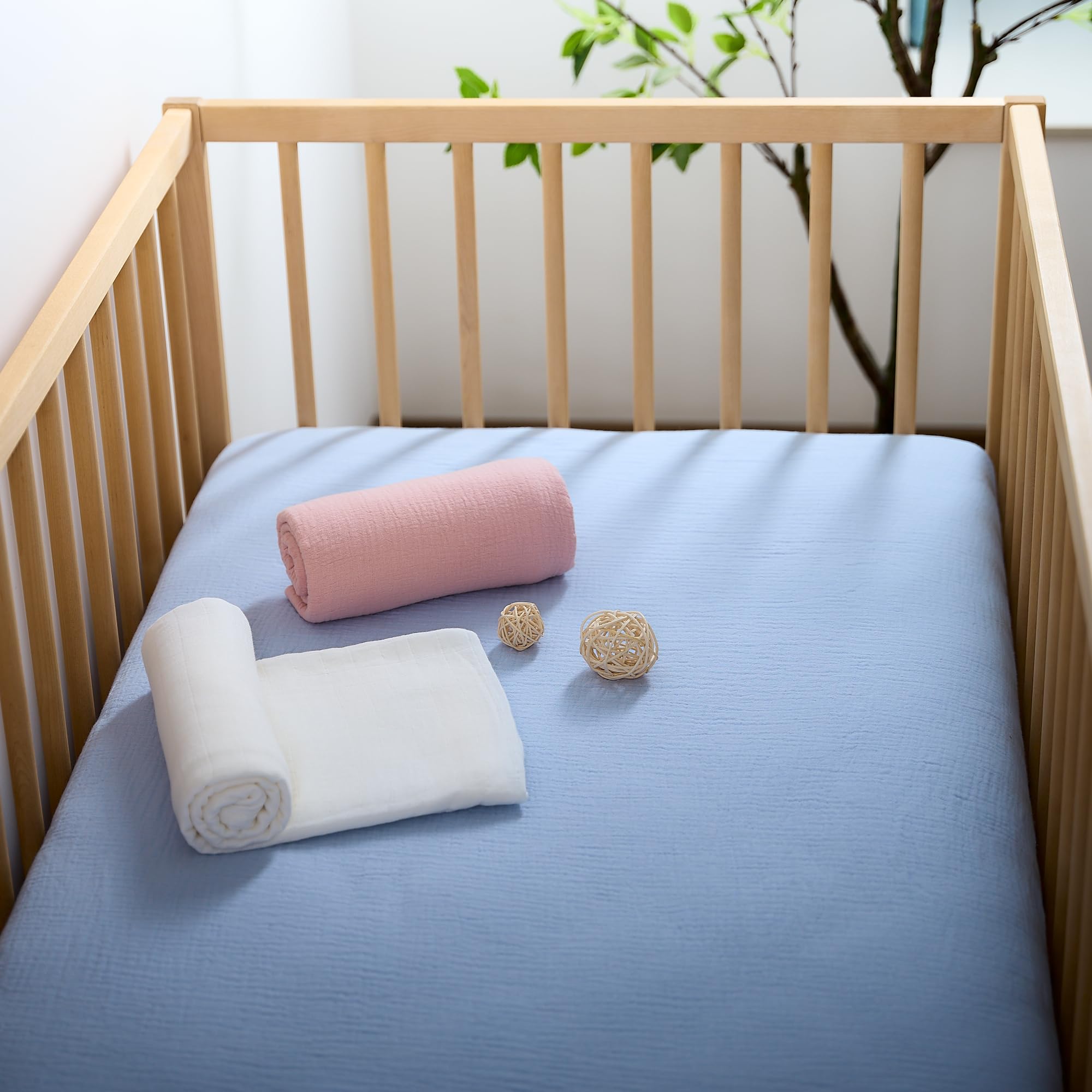 Meracorallo muslin crib sheet pre-washed softness for baby skin.