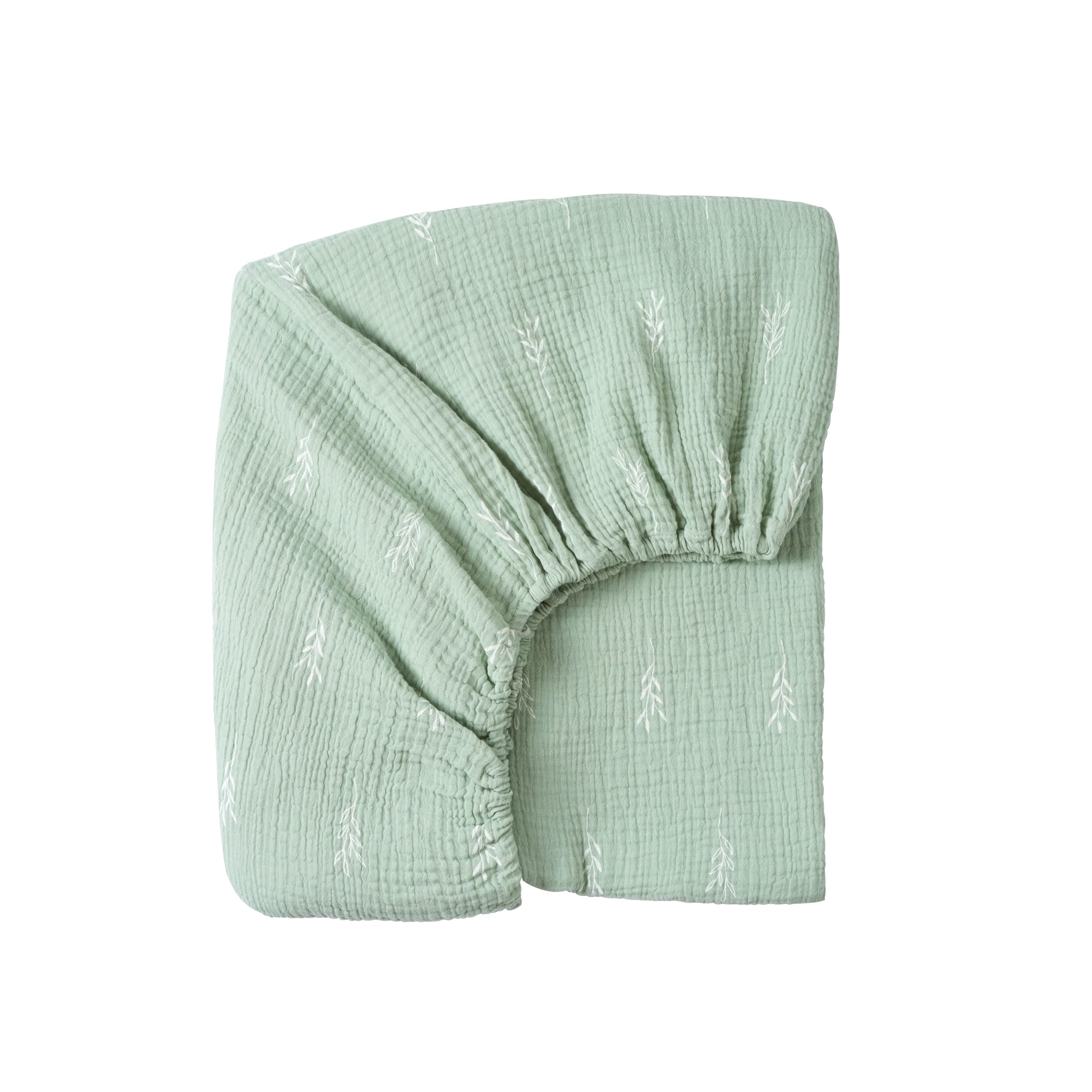 Meracorallo muslin fitted crib sheet in green leaf close-up for breathable sleep
