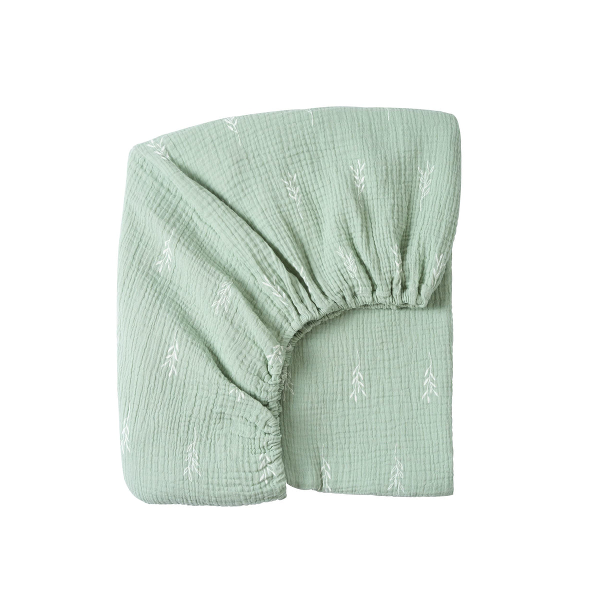 Meracorallo muslin fitted crib sheet in green leaf close-up for breathable sleep