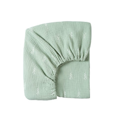 Meracorallo muslin fitted crib sheet in green leaf close-up for breathable sleep