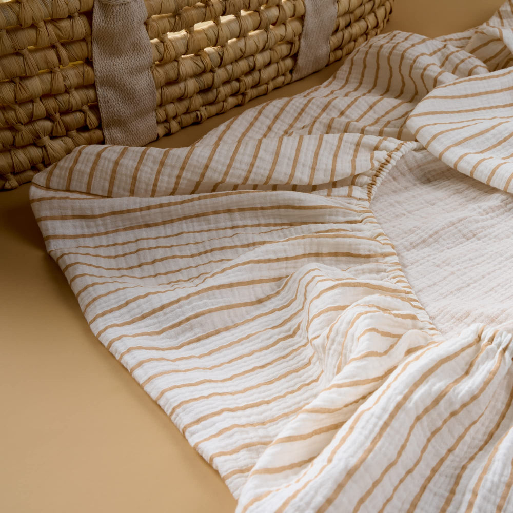 Meracorallo sheet fits up to 9-inch mattresses for standard cribs