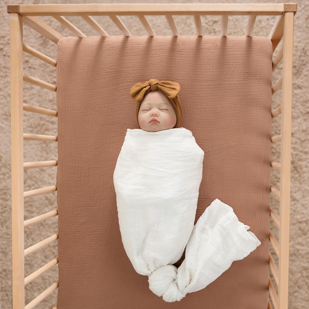 Meracorallo Muslin Mini Crib Sheet breathable weave promotes air circulation.