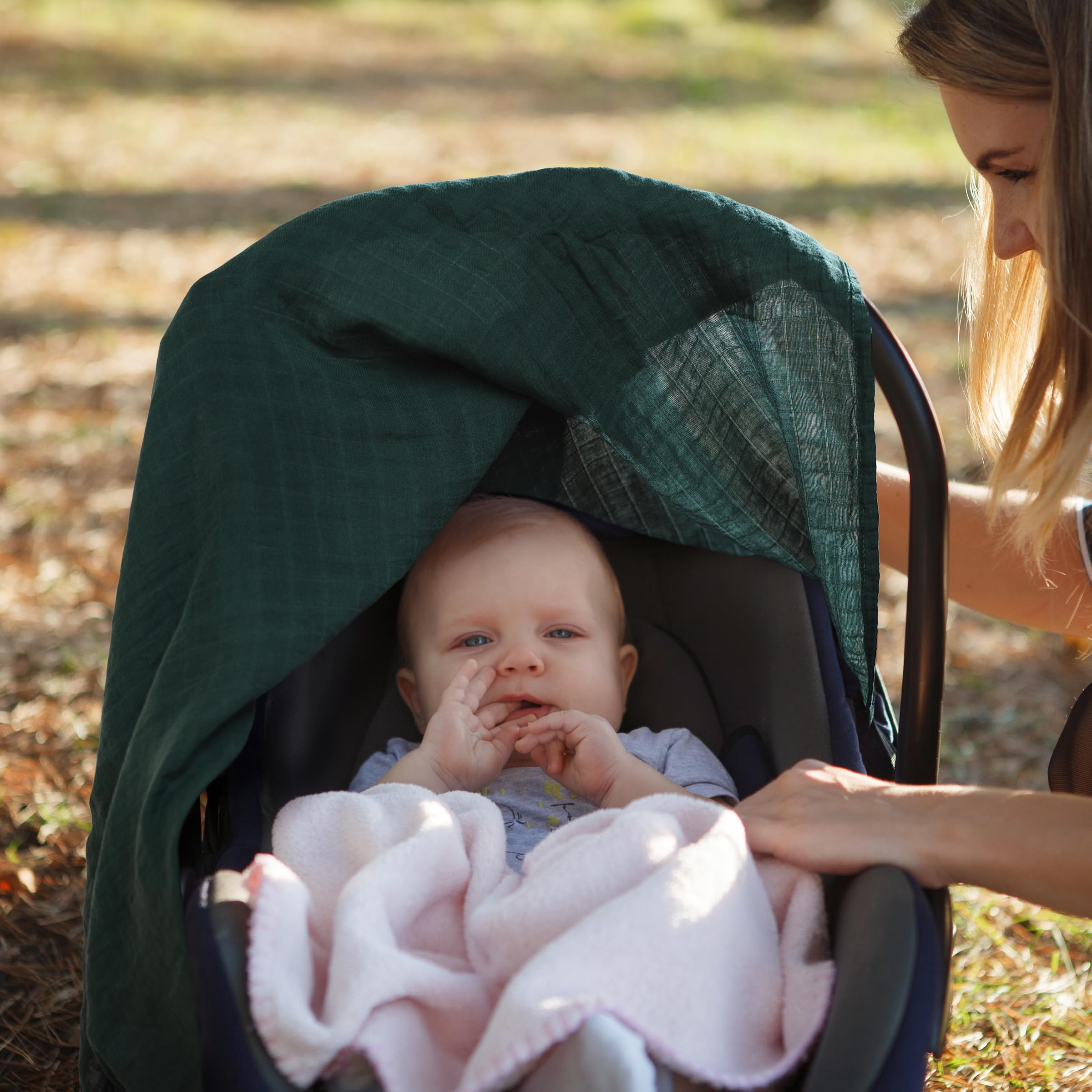 Meracorallo muslin cover doubles as nursing privacy shield during feeds.