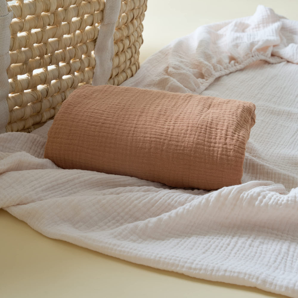 Meracorallo Muslin Pack-n-Play mattress compatibility fits standard sizes.