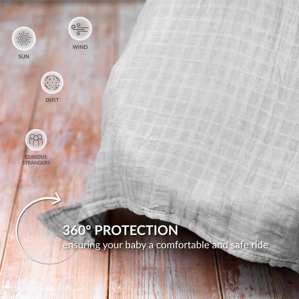 Meracorallo muslin canopy keeps baby cool on hot days outdoors.