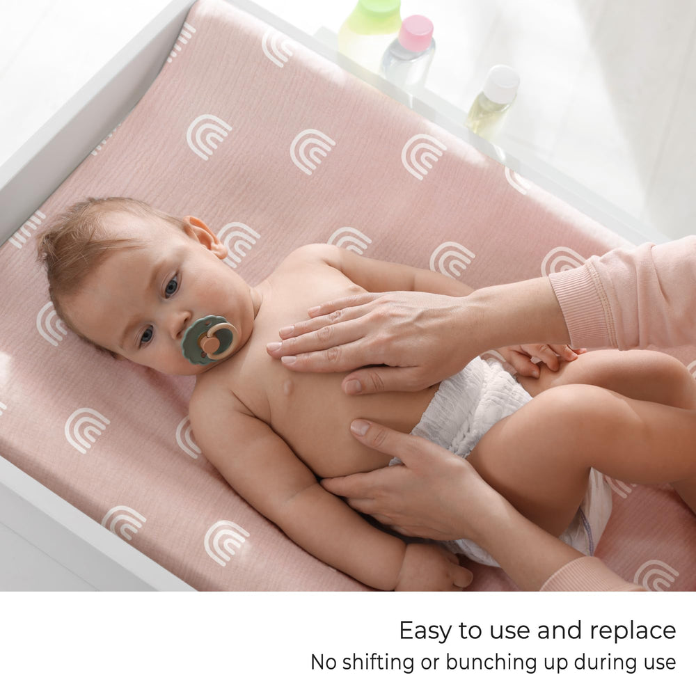 Meracorallo rainbow changing pad cover elastic edge detail ensures secure fit during changes.